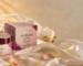 Aurora Luxe Brightening Cream 50g on luxury silk fabric